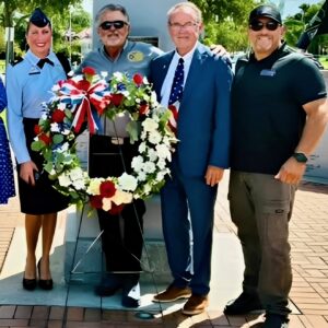 USAF Lt Col Williams, Gold Star parent Craig Gross, Commissioner David Eggers